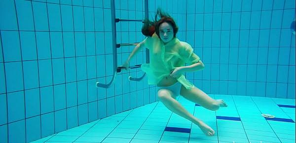 trendsHairy teen babe Nina Mohnatka swims in the pool